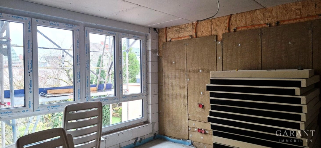 Wandheizung mit Lehmplatten verkleidet
